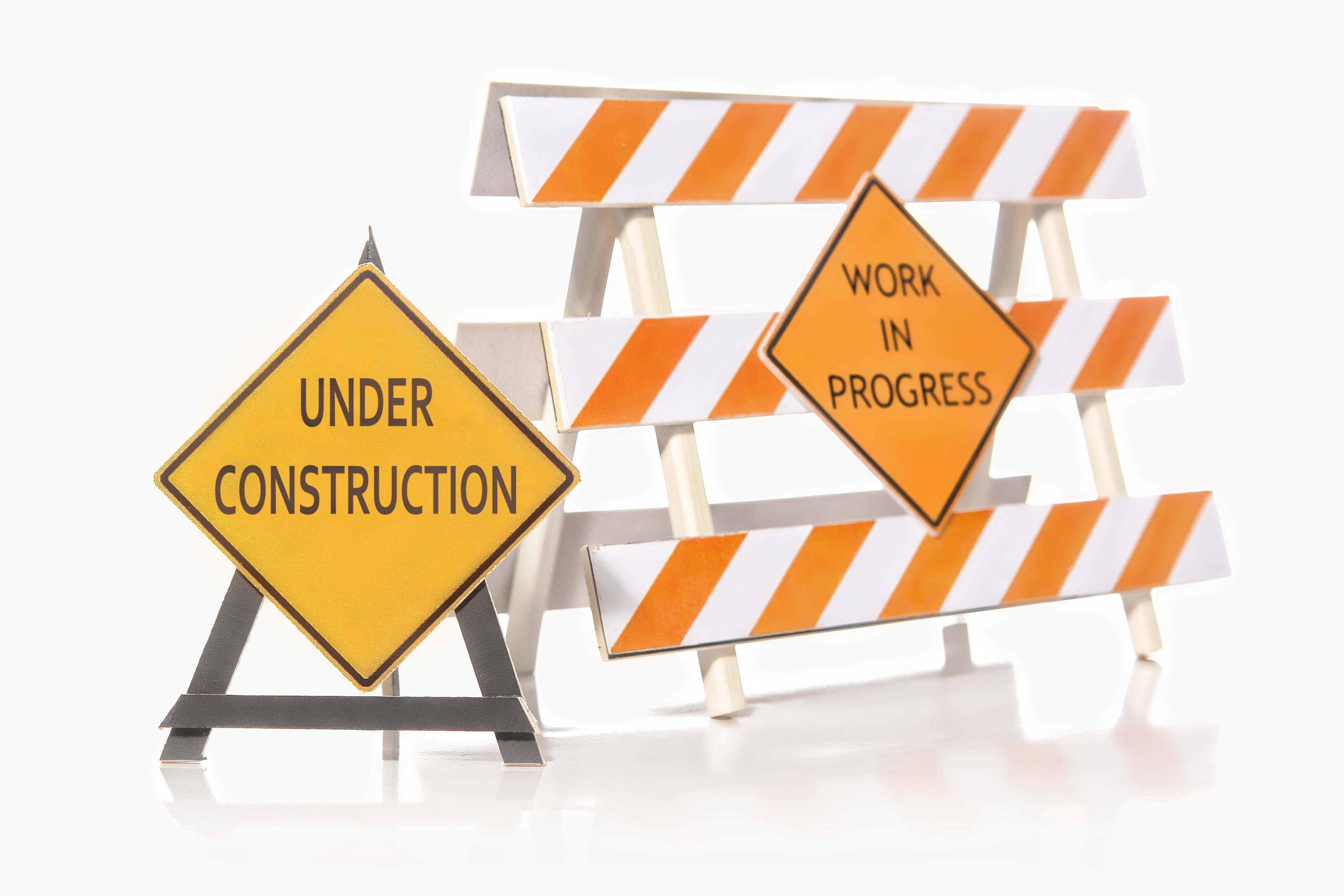 Construction,Warning,Barriers,With,Work,In,Progress,And,Under,Construction
